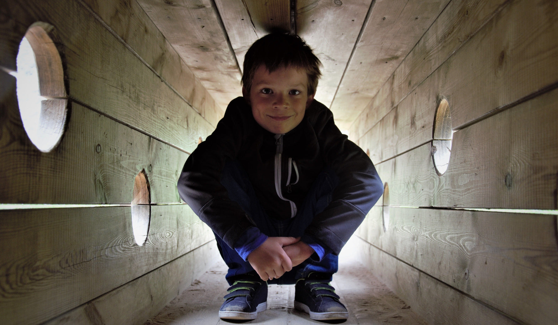 Designing for “Quiet Play”: Why Every Playground Needs a Crawl Tunnel or Playhouse for Introverted Children