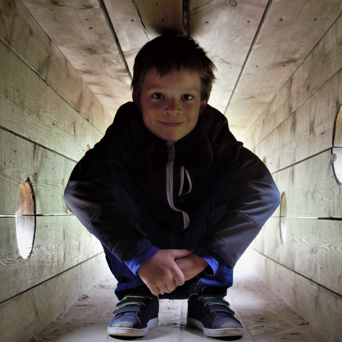 Designing for “Quiet Play”: Why Every Playground Needs a Crawl Tunnel or Playhouse for Introverted Children