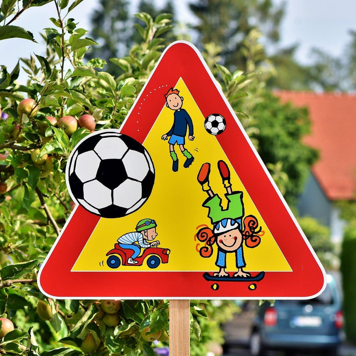 The Big Benefits of Playground Traffic Signs: Teaching Safety Through Active Play